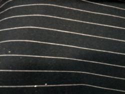 Stoffa monoelastica gessata nera e bianco . Prezzo e unità di misura al metro COD.gessato Tecnodanza